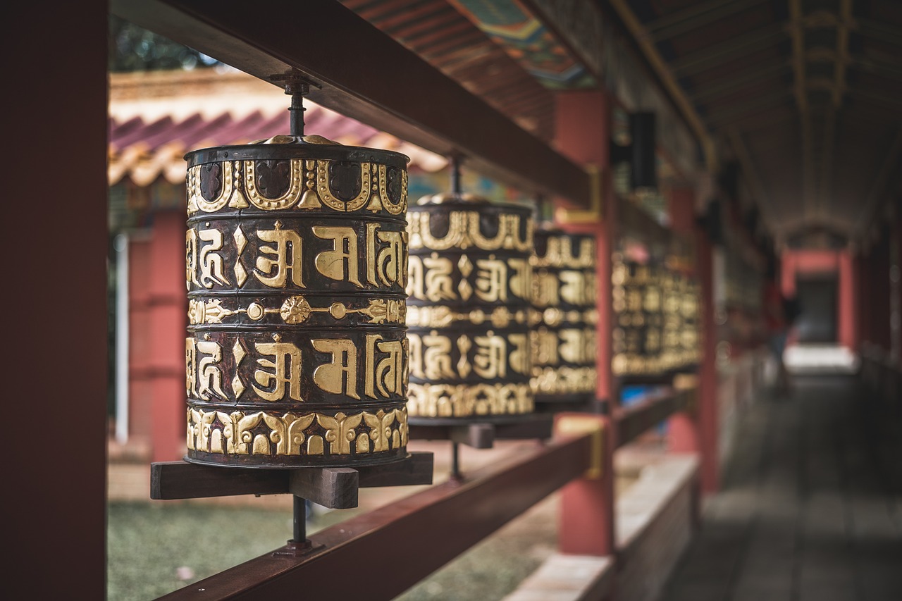 Prayer wheels are cylindrical devices containing written mantras, prayers, or scriptures.