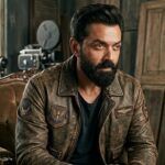 Bobby Deol in a stylish retro leather jacket looking iconic and confident.